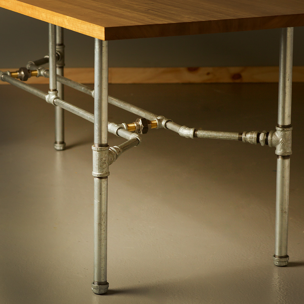 industrial dining table with pipe legs