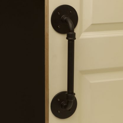 Pipe fitting door pull bar with male elbow